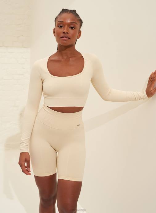 kvinnor AIM'N havre vit lyx sömlös beskuren lång ärm Kläder NBT4333