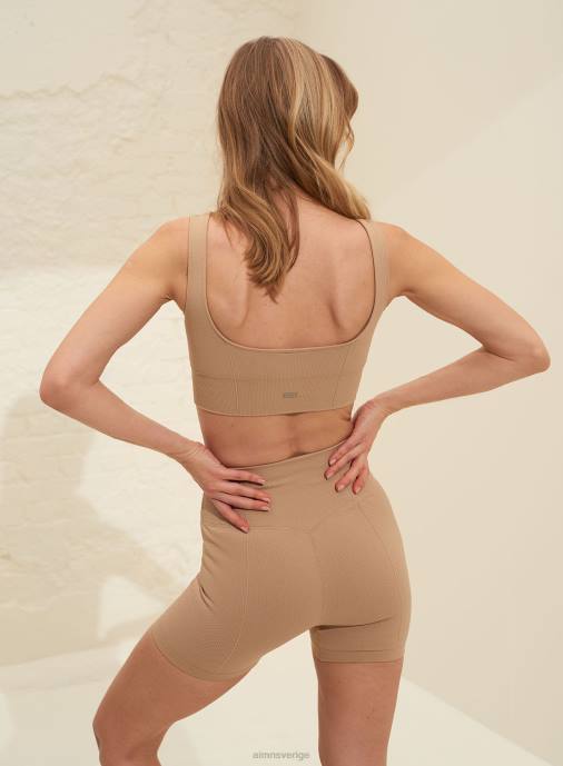 kvinnor AIM'N solid beige lyxiga sömlösa midi-bikershorts Kläder NBT4553